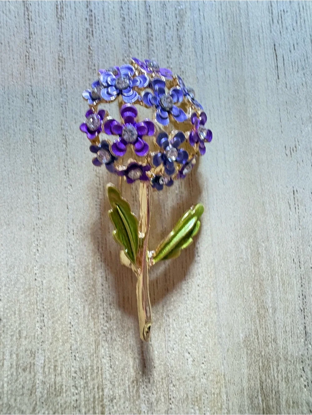 Purple Floral Cluster Brooch with Gold Stem and Green Leaves